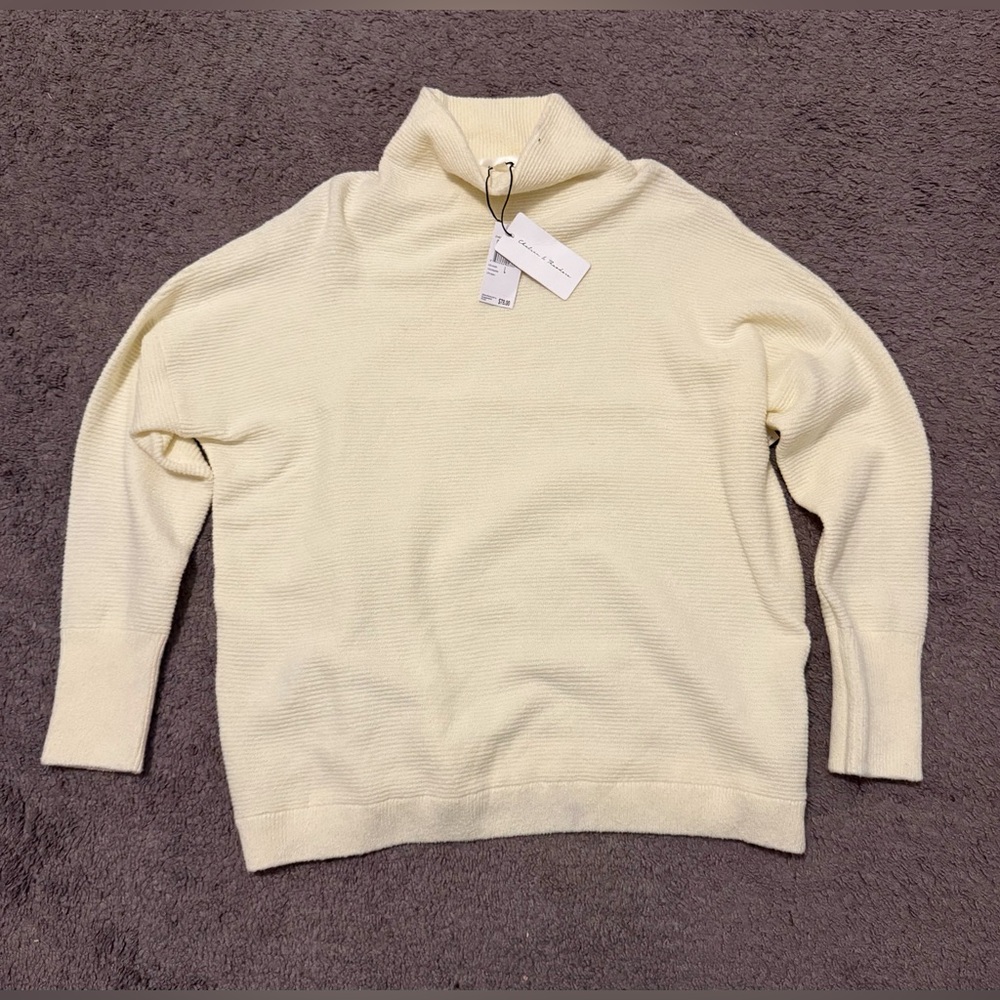 Cream sweater.